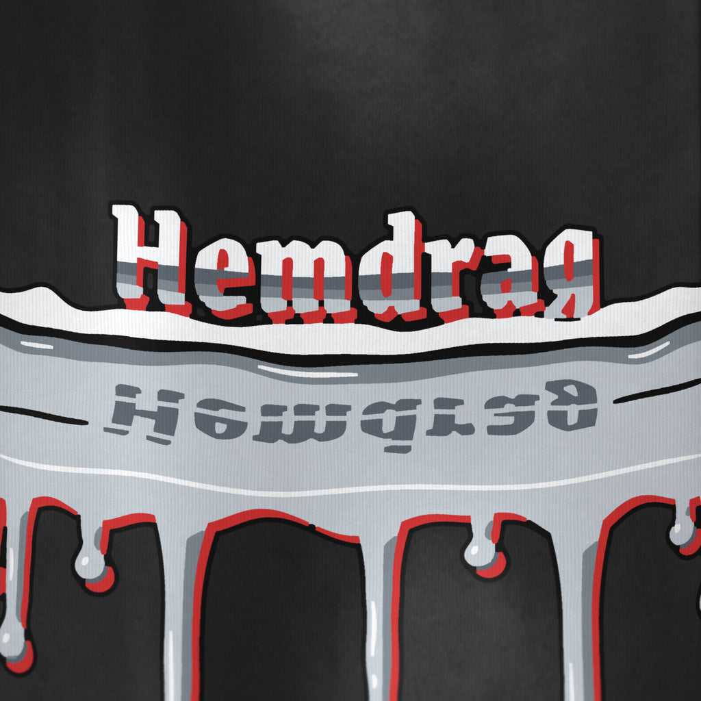 Digital preview: close-up of the right leg: Hemdrag in chrome blackletter standing on the waterline, its upside-down reflection in the flood below, and drips running toward the hem. The print and fabric texture are simulated.