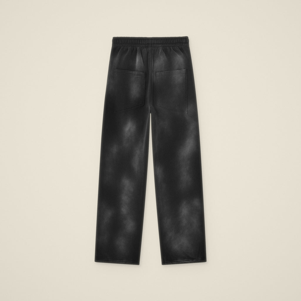 Digital preview: back of the black sunfade sweatpants laid flat, with two back pockets and no print. The wash pattern varies on every pair.